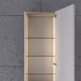 Large bathroom in green colors with vanity unit, brass framed oval mirror and beautiful framed doors