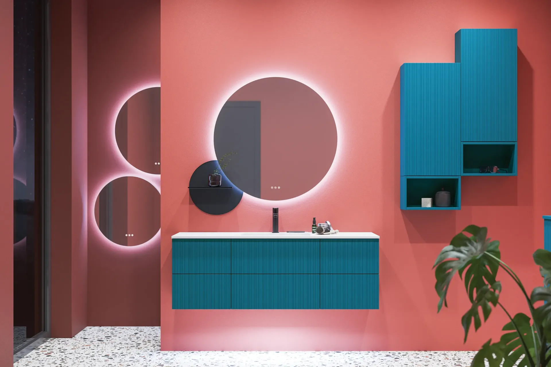 Large bathroom inspiration with blue special color grooved furniture, thin elegant sink, and beautiful round mirrors, red walls, and terrazzo floor create a strong contrast to the furniture, giving a stylish and urban look.