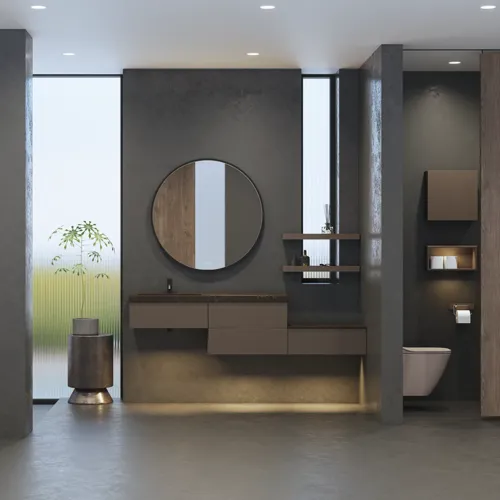 Stylish and spacious bathroom inspiration with a large round mirror with a black frame, dark stone sink, colored toilet, upper cabinet, and open shelf in a sophisticated and muted design