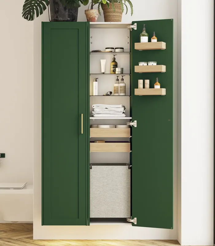 Large bathroom in green colors with vanity unit, brass framed oval mirror and beautiful framed doors