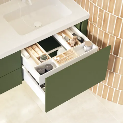 Large and luxurious bathroom with lovely oval mirrors and beautiful tiles in natural colours