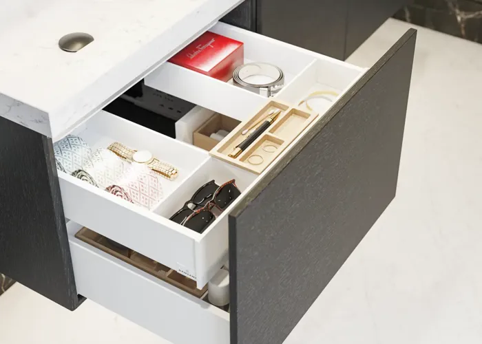 Elegant and modern bathroom inspiration with dark marble walls, round illuminated mirrors with black frames, wall-mounted vanity unit with double sinks, and a spacious shower area