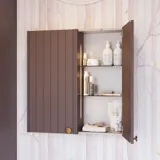 Bathroom inspiration with custom purple cabinets featuring elegant grooves, stylish countertop with a vessel sink, large mirror with brass edge, tiles and walls in purple shades create a romantic and feminine look