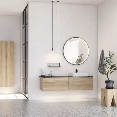 Large urban bathroom inspiration with natural oak furniture, stone countertop with square basin, round mirror with black frame, natural colors, and terracotta floor for an industrial and modern look