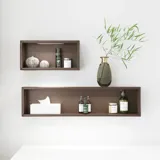 Nordic style bathroom inspiration with vanity unit and base cabinets in smoked oak, makeup area, side-mounted sink, round mirror with brass frame, and visible charming wooden beams.