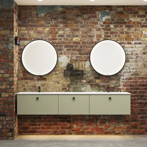 Raw and modern bathroom in an urban style. Beautiful vanity units and black framed round mirrors